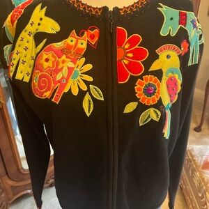 Beautiful detailed sweater with intricate appliqué